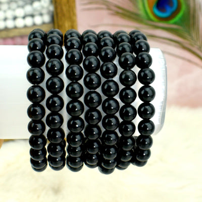 close up of the details on the black obsidian bracelets 