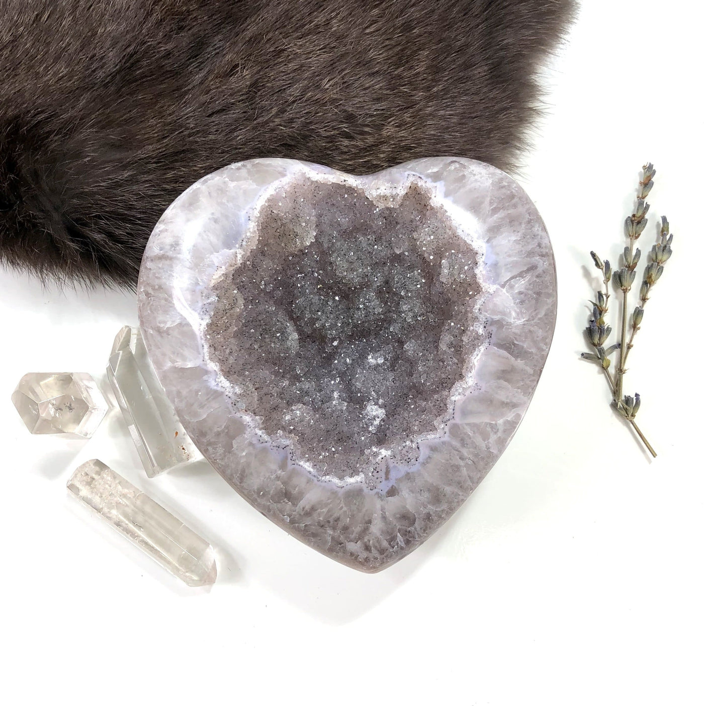 Front view of Polished Agate Druzy Gray Heart on white surface