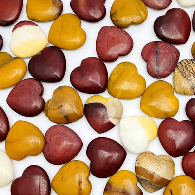 mookaite hearts on a table scattered