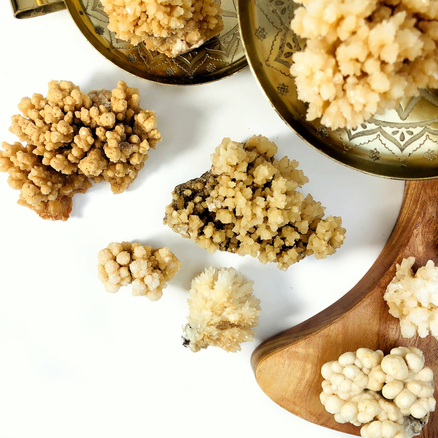 8 Calcite Druzy Formations on a white background