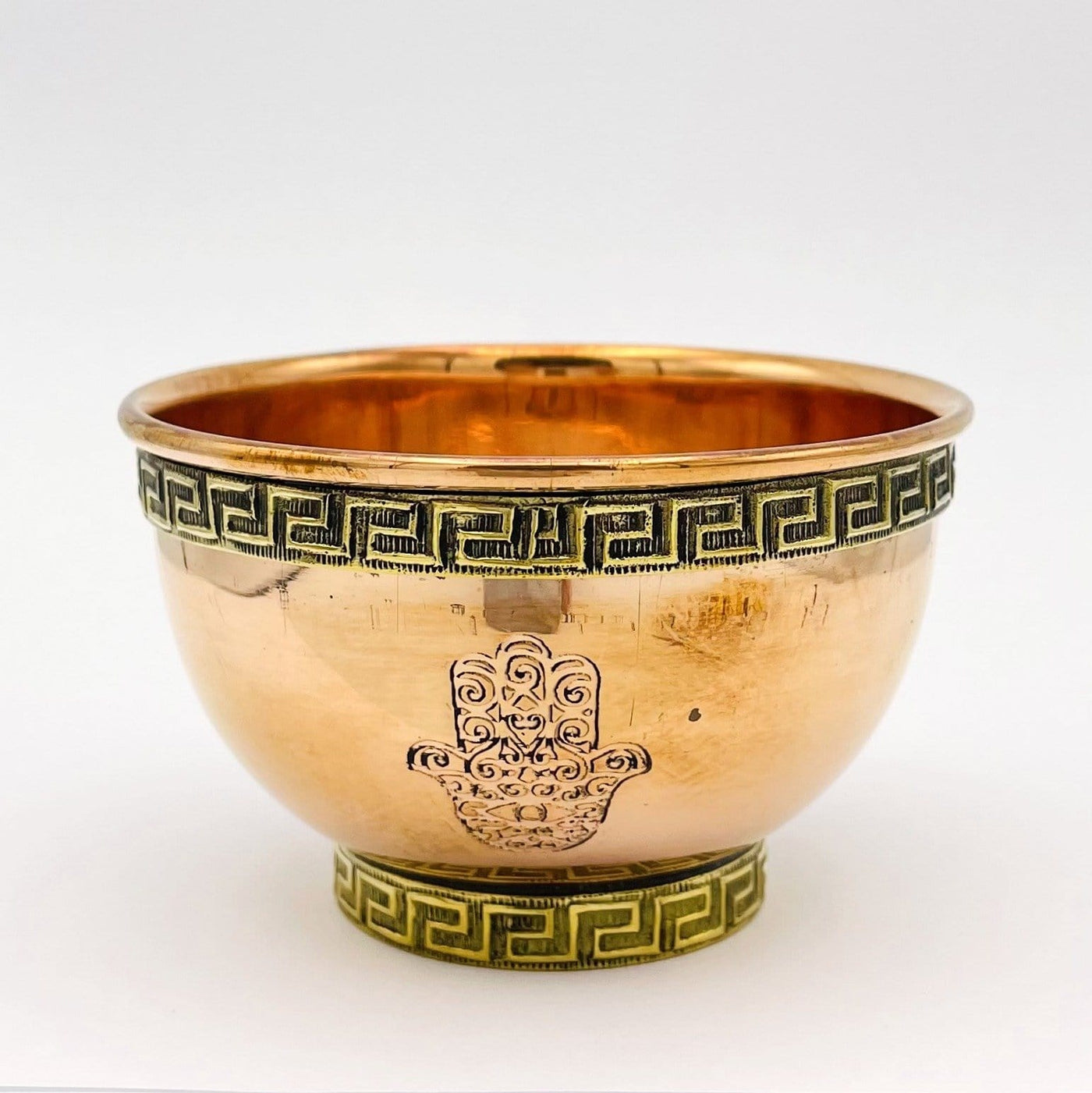 offering bowls have engraved designs on the top and the bottom portions 