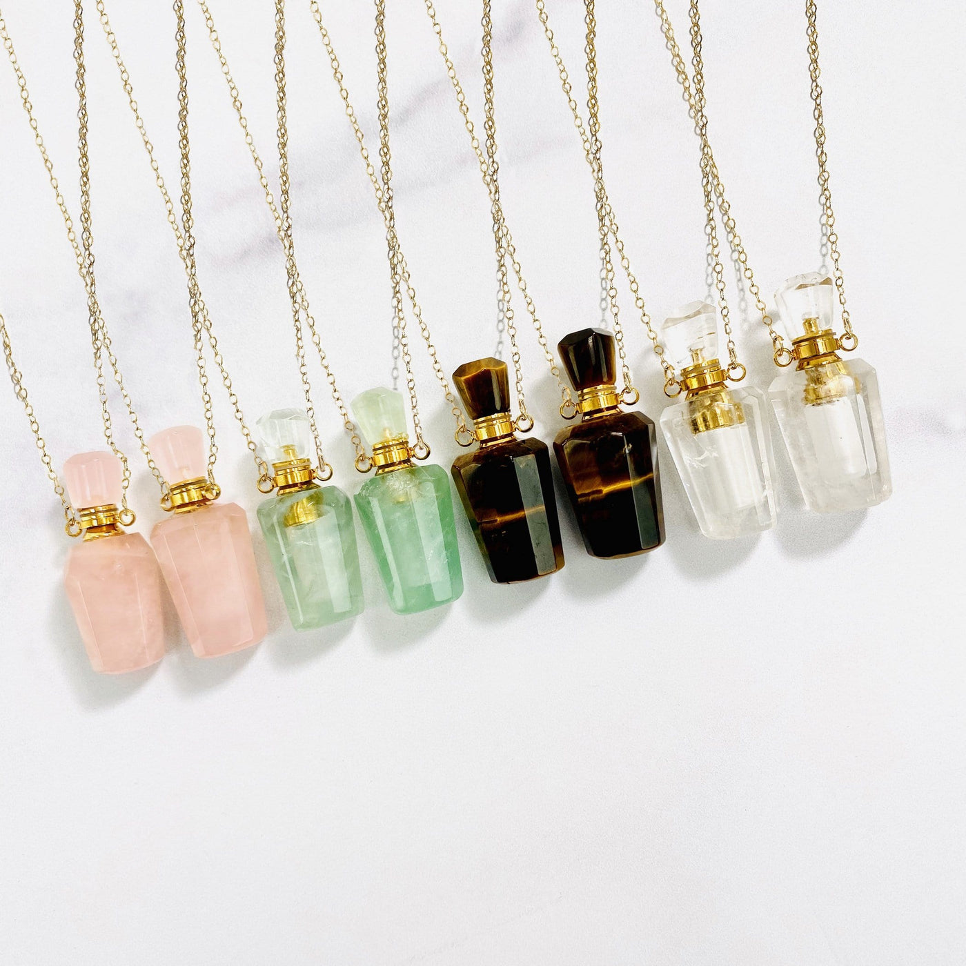 gemstone necklaces bottles