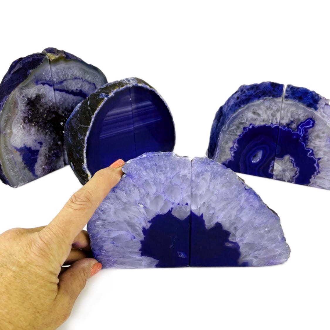 Agate Book Ends displayed front facing with a hand.