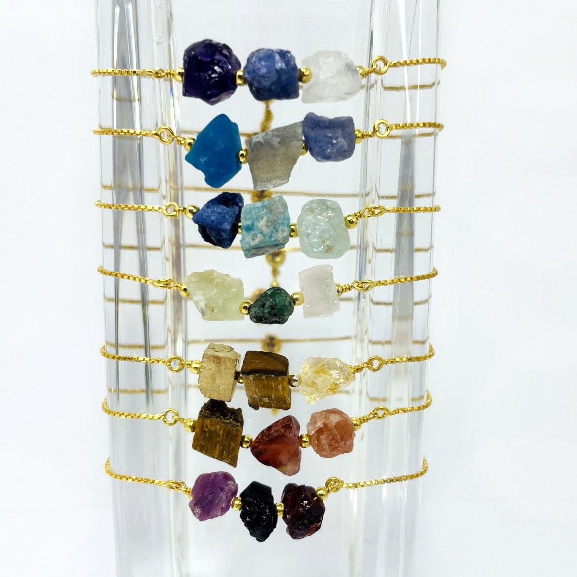 chakra themed three stone adjustable bracelets in gold