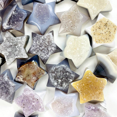 close up of Multiple Natural Agate Druzy Star Cabochons showing color and pattern variations