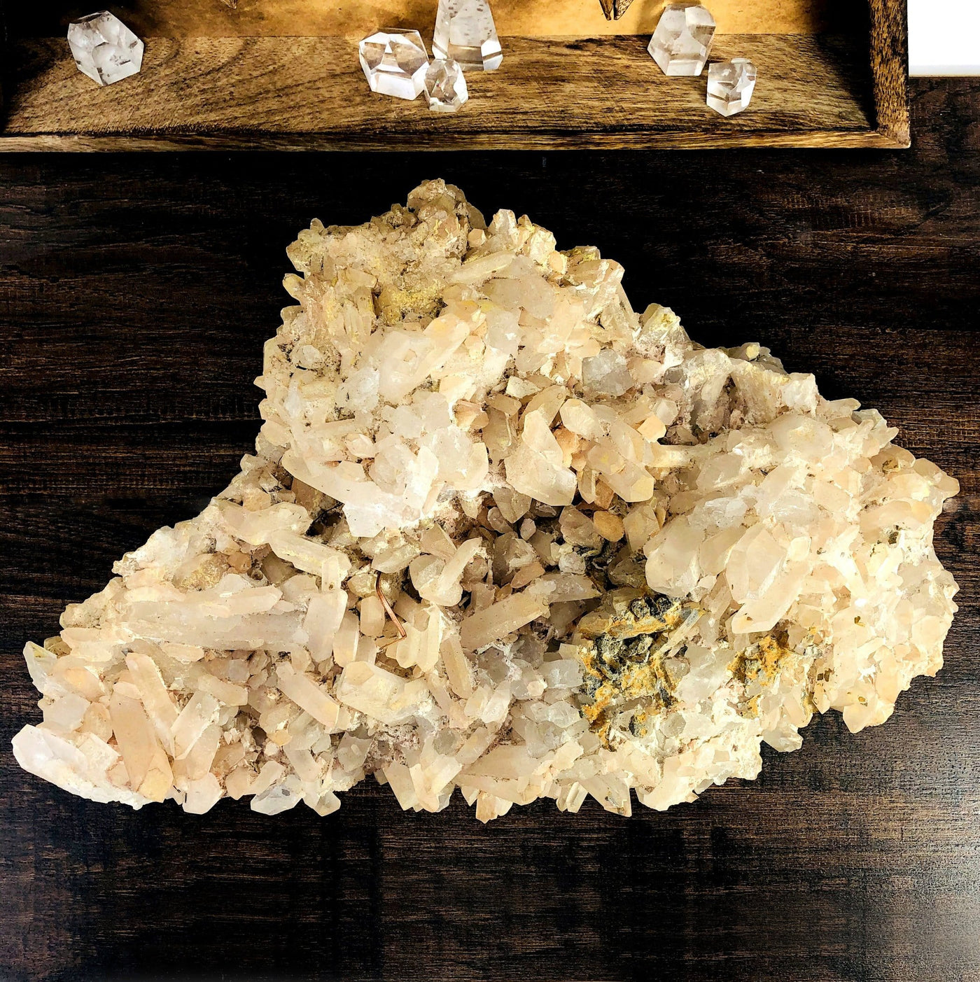 top view of Madagascar Quartz Cluster with decorations in the background