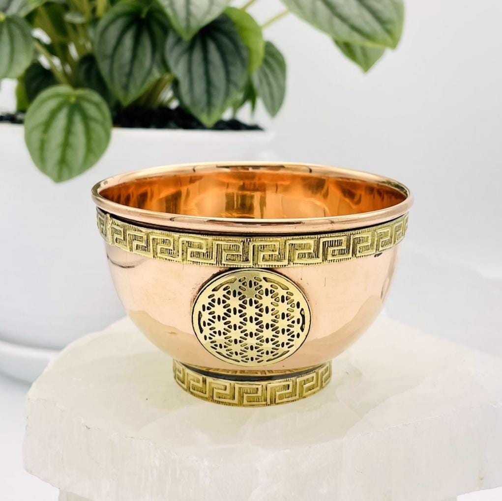 copper offering boel with flower of life close up