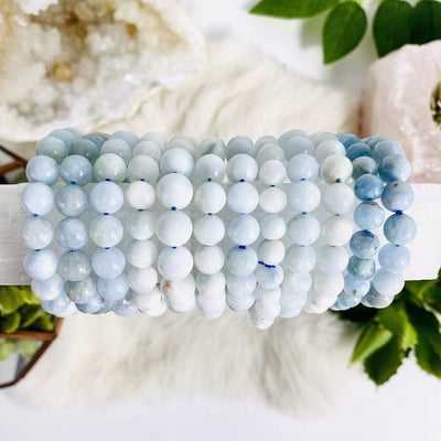 larimar bead bracelets with decorations in the background