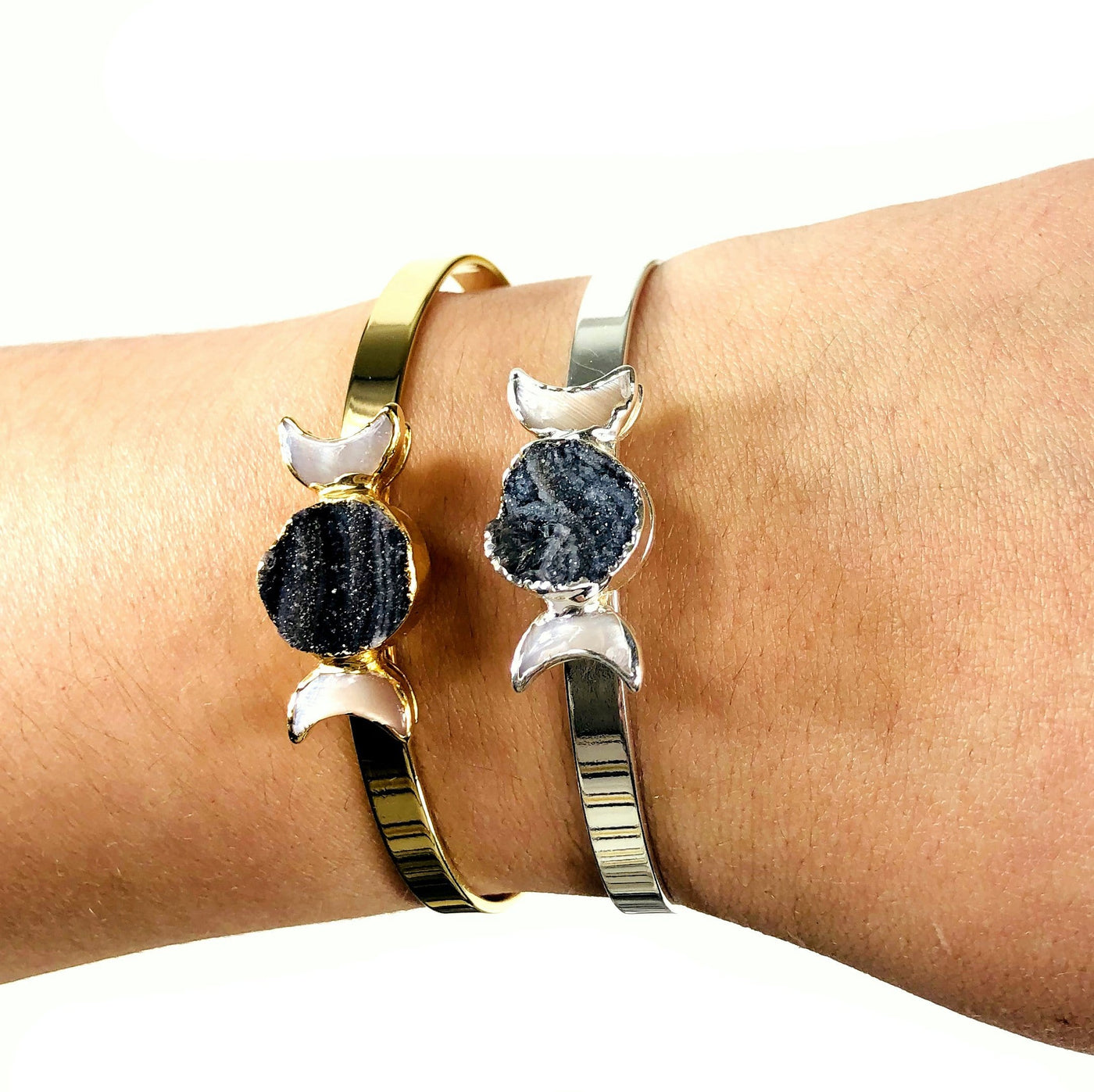 Close up of Two Moon Phase Bracelets on a wrist for size reference