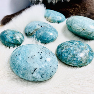 Side shot picture of amazonite palm stones. 