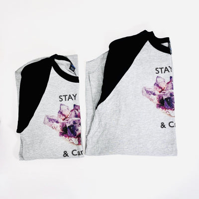 different sized Stay Calm and Carry One baseball shirts
