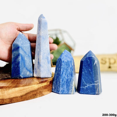 Four Blue Quartz Tower Points in sizes 200-300g showing variety of sizes