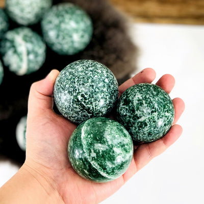 Qinghai Jade Quartz Polished Spheres - View of three jade quartz spheres