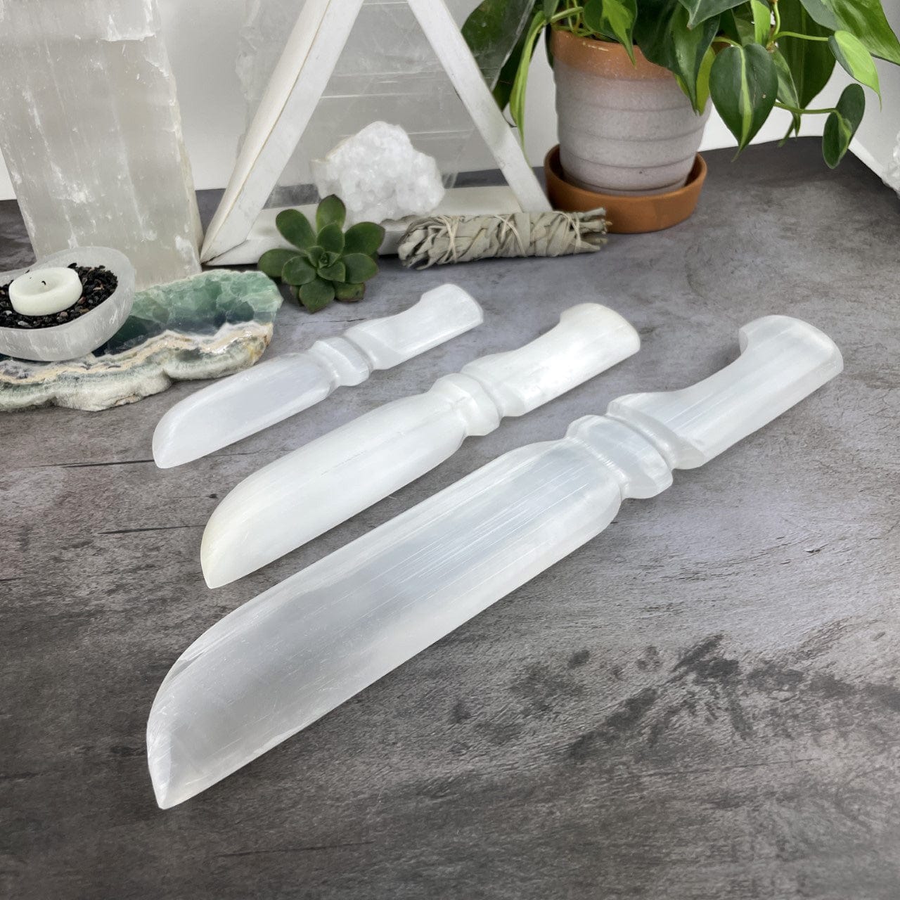 3 sizes of Selenite Knives with Hand Cut and Polished Handles from the side