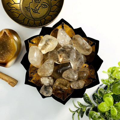 Smokey Quartz Tumbled Gemstones in a gold dish