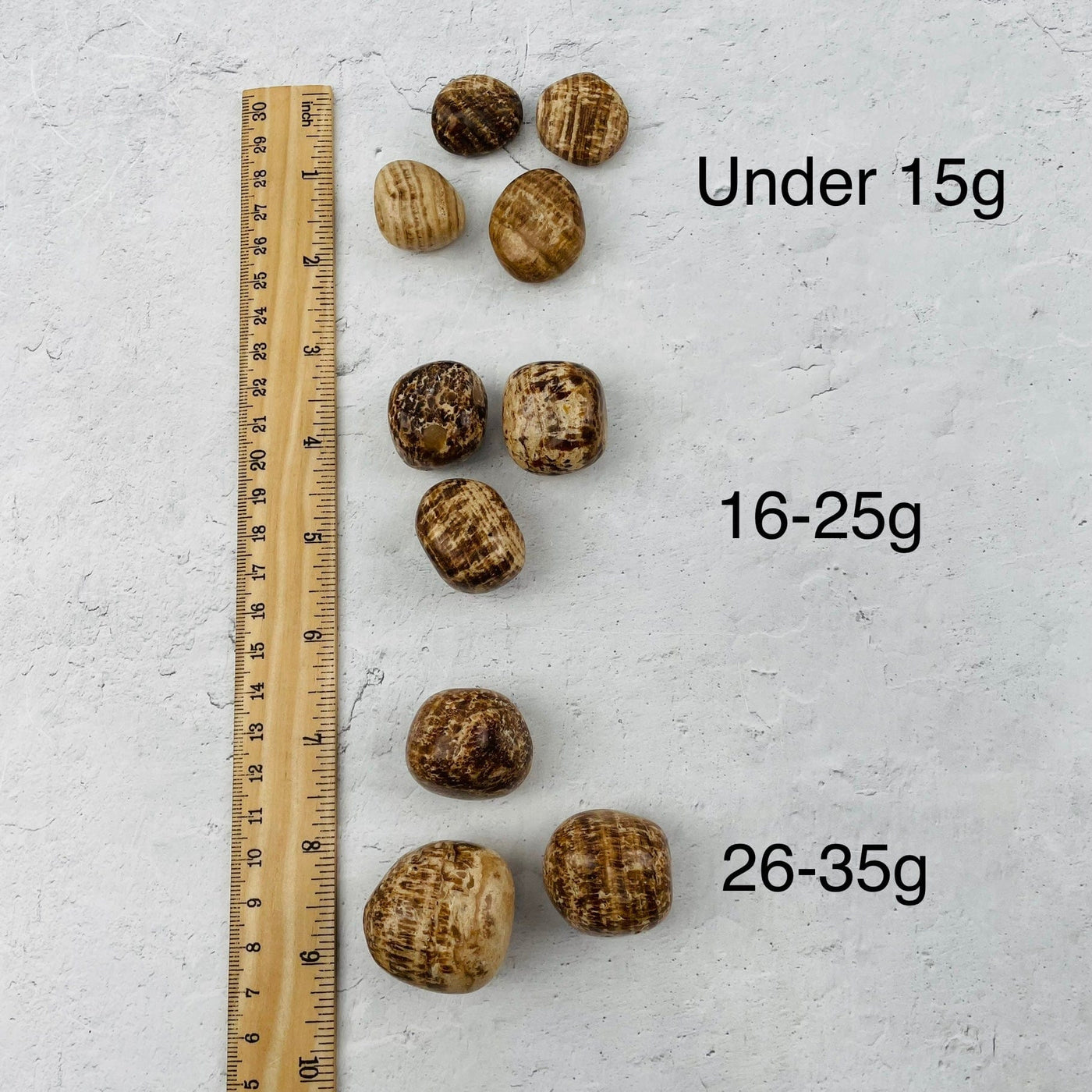 Aragonite Tumbled Stone - Polished Stones - Choose by Weight. next to a ruler for size reference 