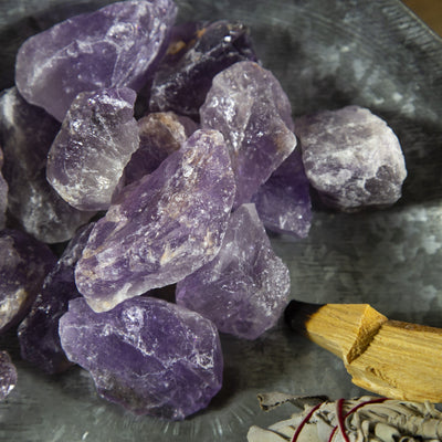 close up of amethyst chunks in a bowl