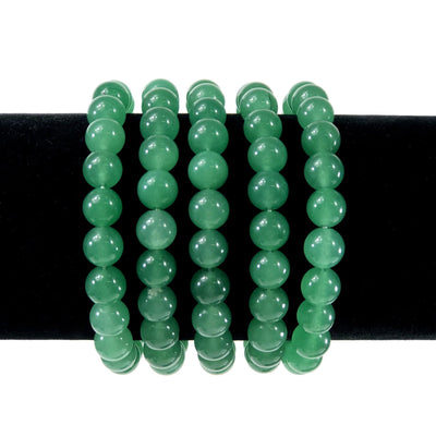 green aventurine healing stone bracelets on a display stand with white background
