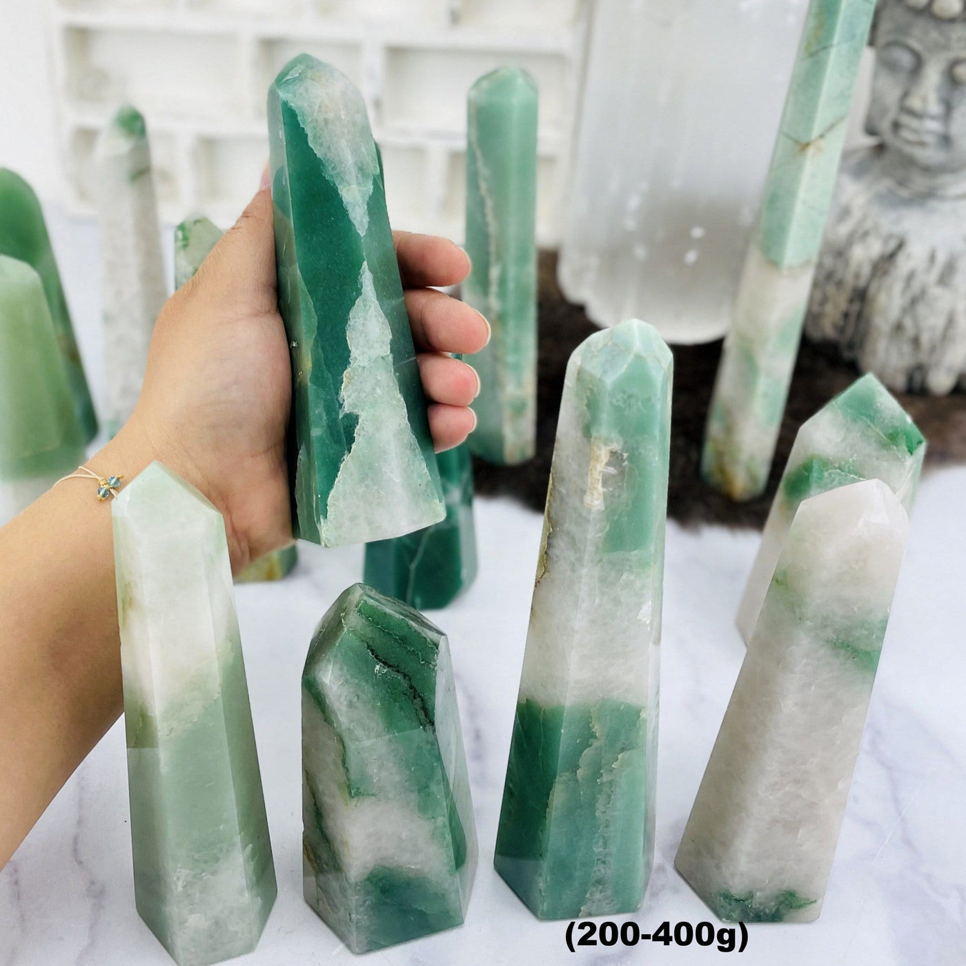 Green and White Quartz Polished Points--front view of 200 to 400 grams with different shades and sizes.