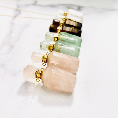 bottle pendants in a row on a table