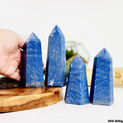 Four Blue Quartz Tower Points weighing at 300-400g in a variety of sizes