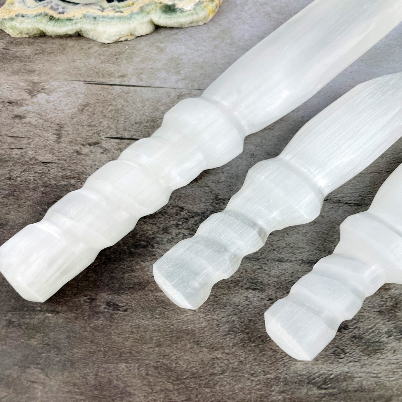 3 sizes of Selenite Knives with Twisted Handles close up