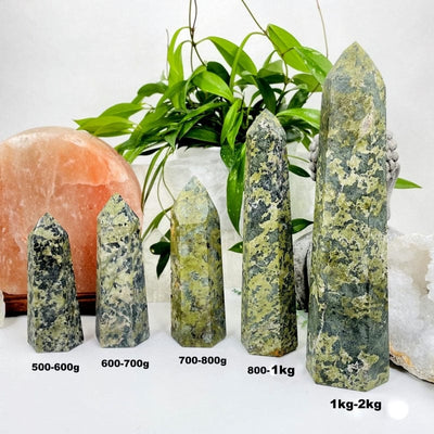 jadeite tower points next to their weight in grams and kilograms 