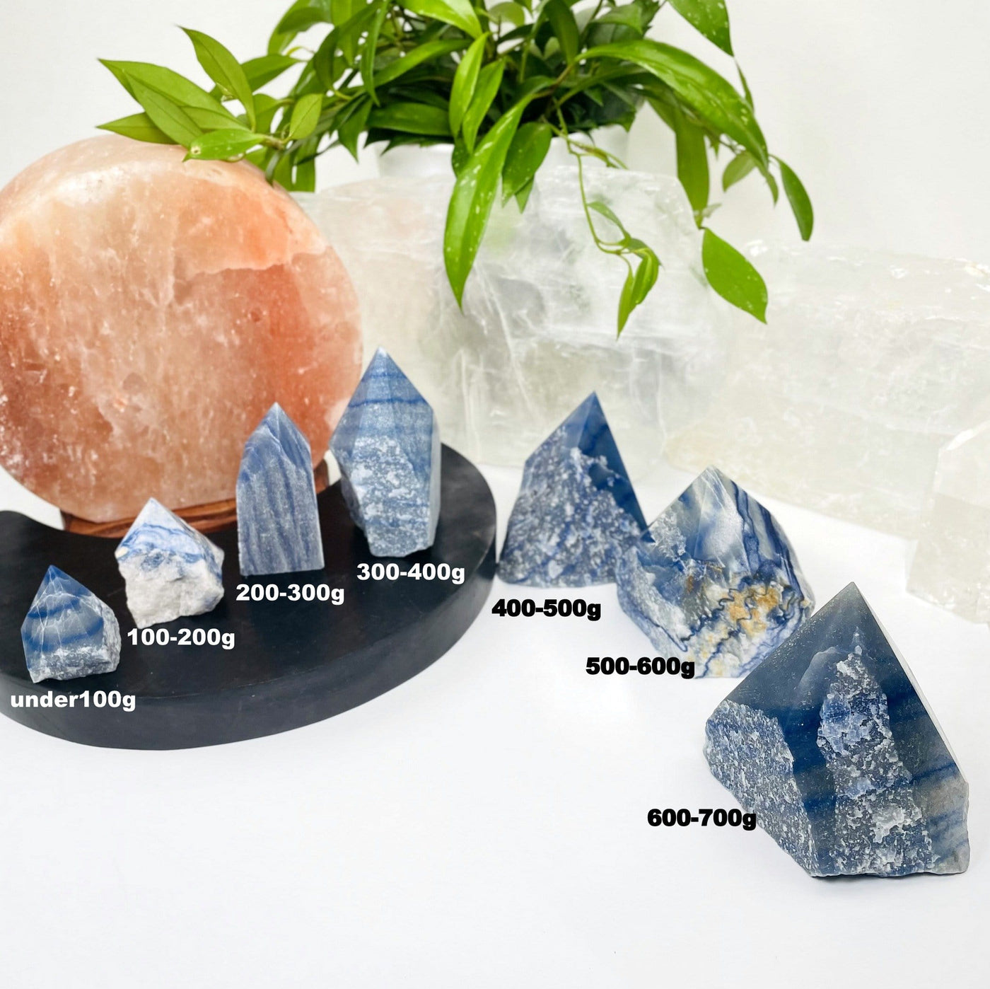 blue quartz points showing the weight in grams 