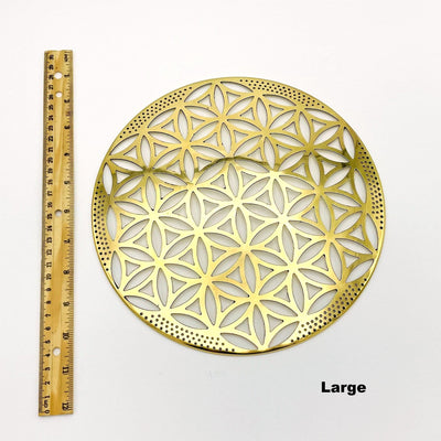 flower of life grid available in large size. displayed next to a ruler for size reference  