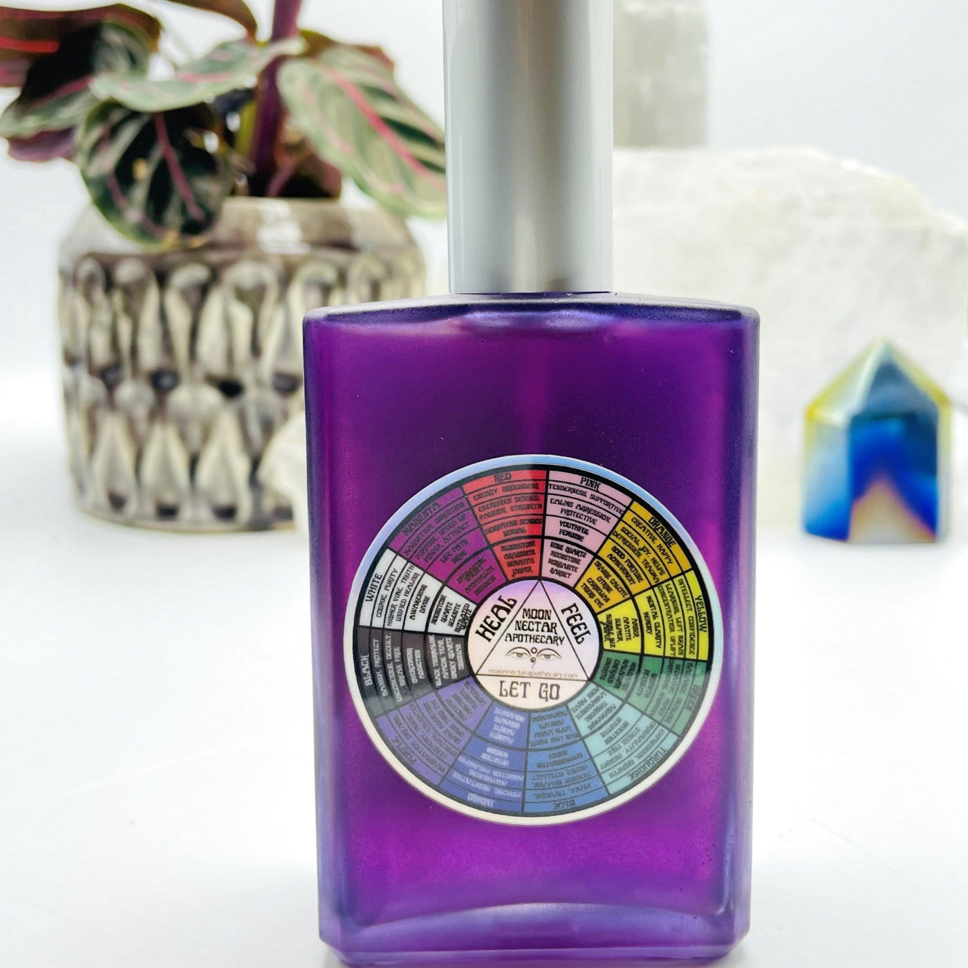back view of Gemstone Mist - Violet Vibrational Color with decorations in the background