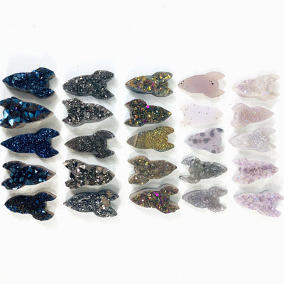 multiple rocket druzy cabochons displayed to show various colors textures sizes shape per style