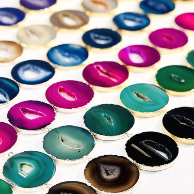 Close up of Agate Circle Slice Pendants to show the pattern and color variation.
