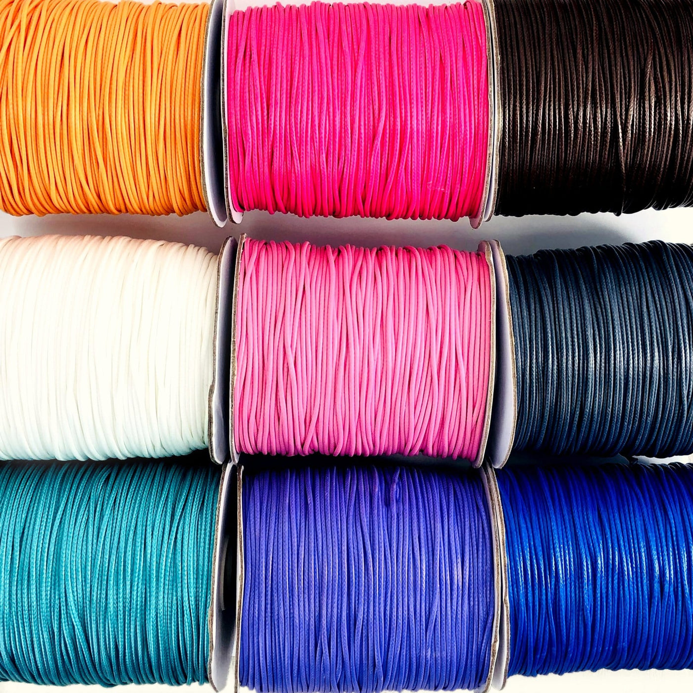 multiple colored cord string spools displayed to show the differences in the options available 