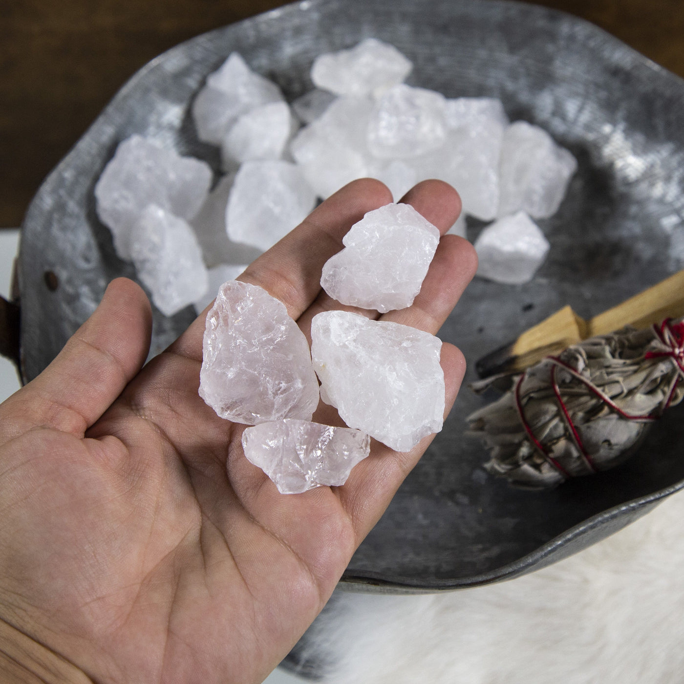 rough crystal stones in a hand
