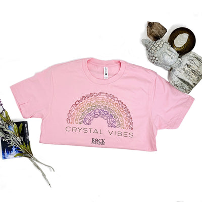 pink Crystal Vibes Shirt with decorations in the background