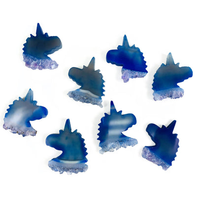 Blue agate unicorn heads, displayed on a white background.