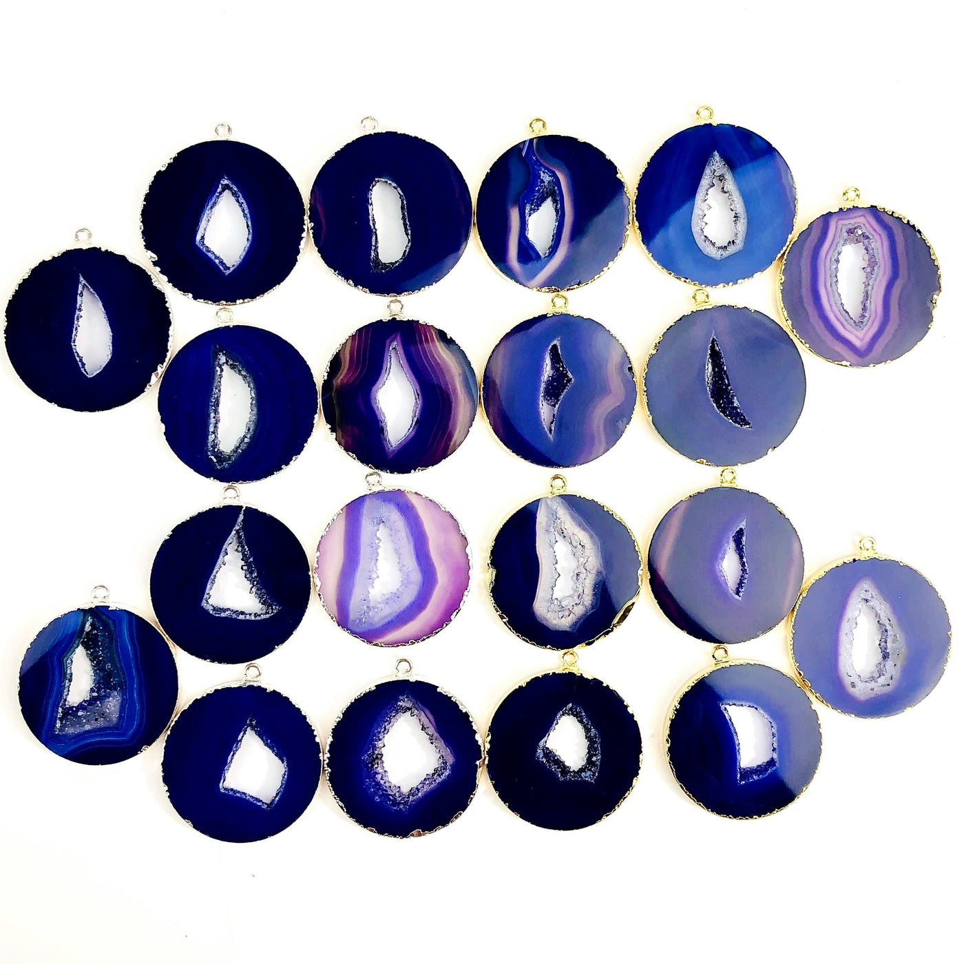 Multiple Purple Agate Circle Slice Pendants to show color and pattern variation.