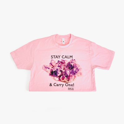 pink Stay Calm and Carry One t shirt on white background