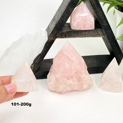 rose quartz semi-polished point showing size in grams 