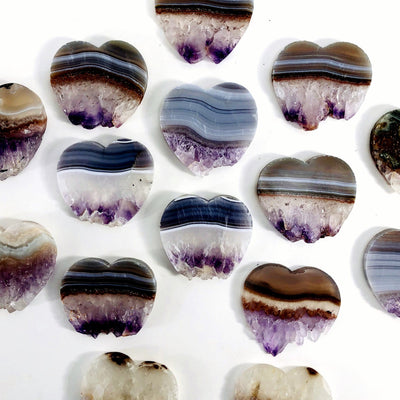 Amethyst Heart Slices  spread on a table