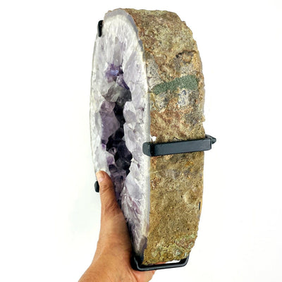 Amethyst Point Mirror in a hand for size reference