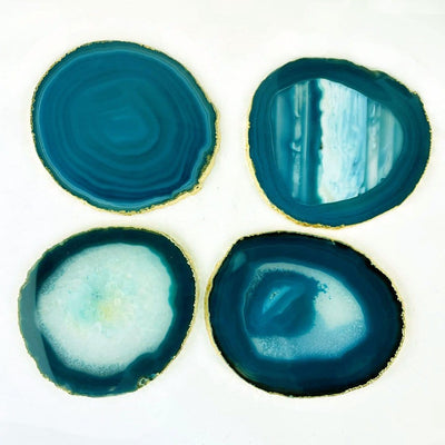 4 Teal Agate coasters with a gold electroplated edge Slices measure about 3.5-5"