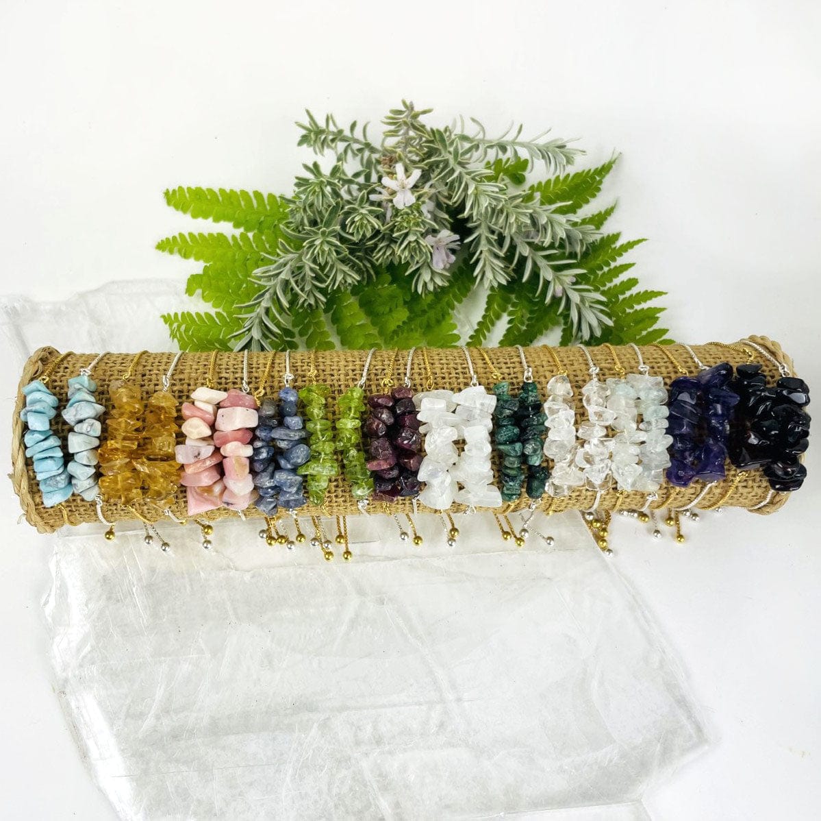 All Stone Bracelets - Birthstone - Gold over Sterling or Sterling Silver Adjustable Length stacked up on a holder