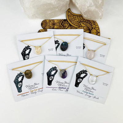 Worry stone necklaces on their display cards