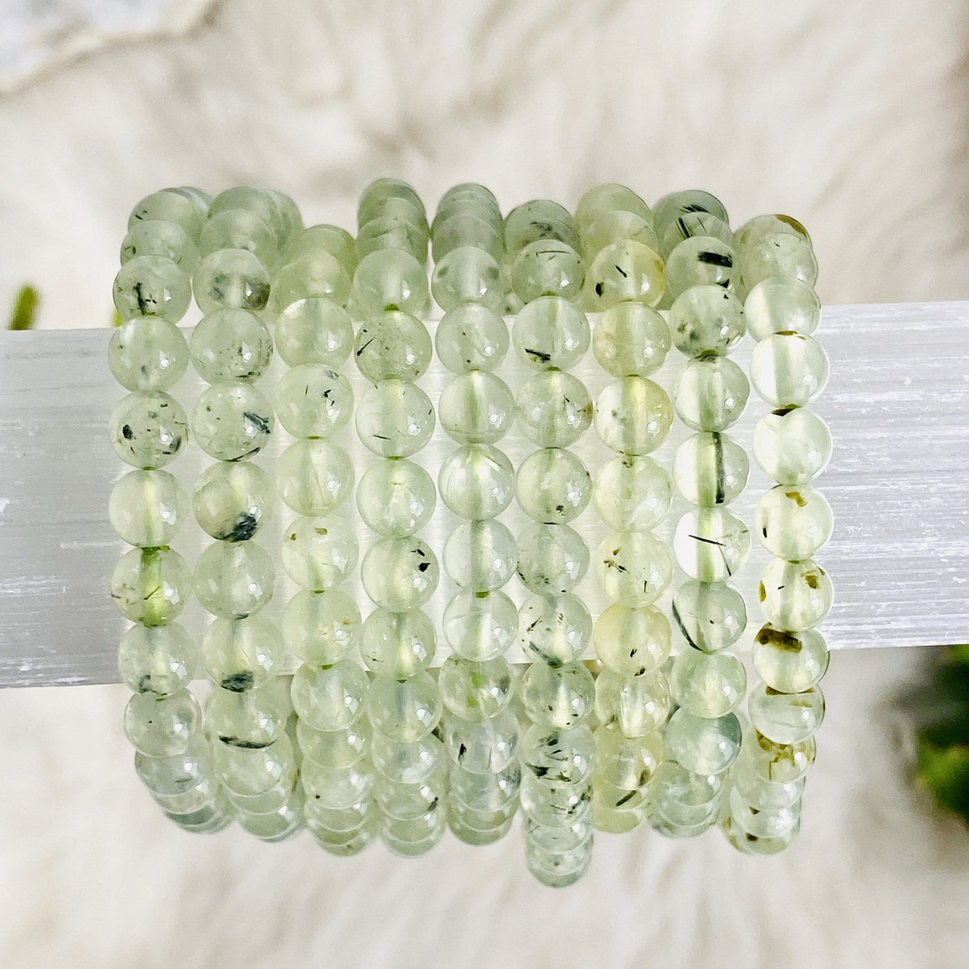 prehnite bracelets on a cylinder