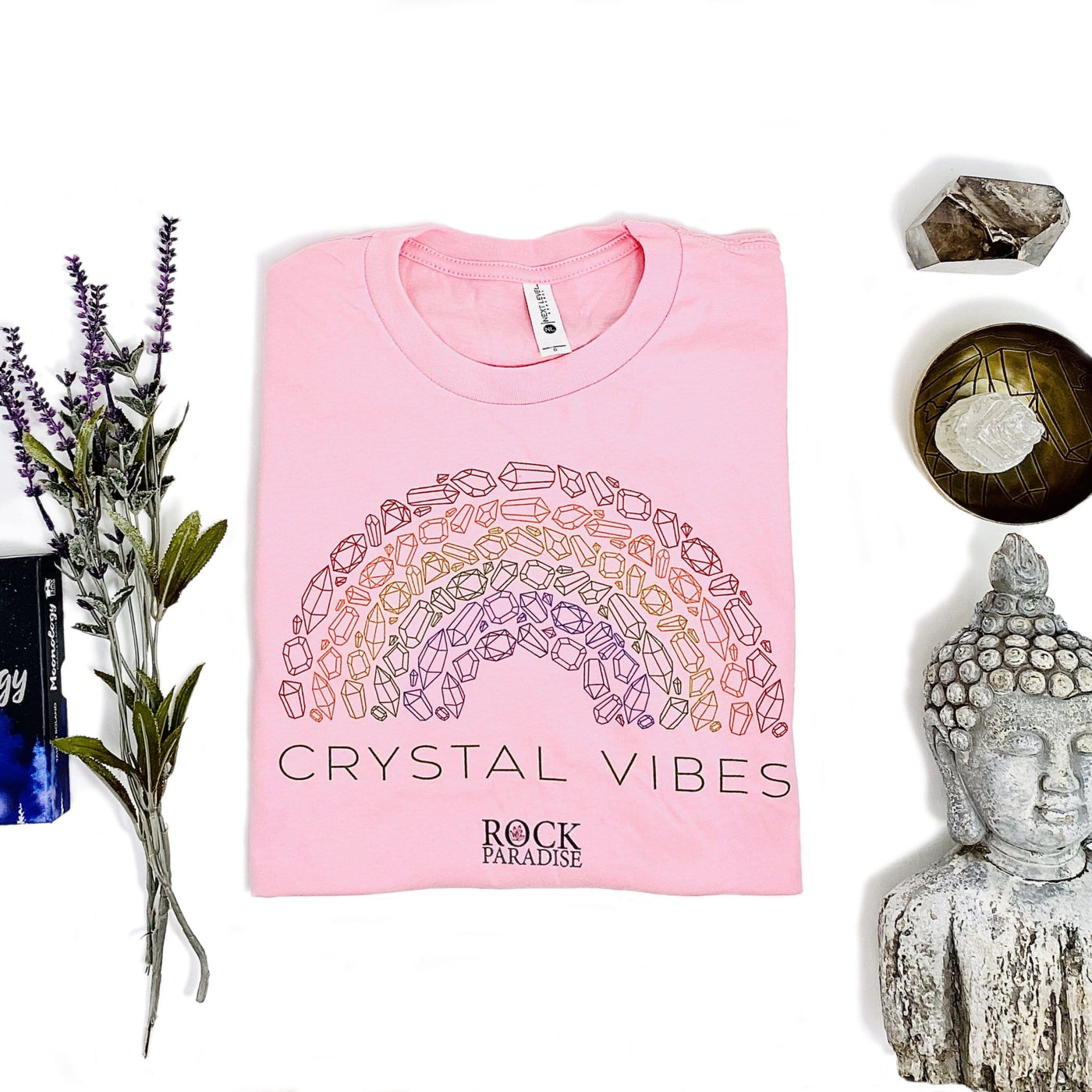 pink Crystal Vibes Shirt with decorations in the background