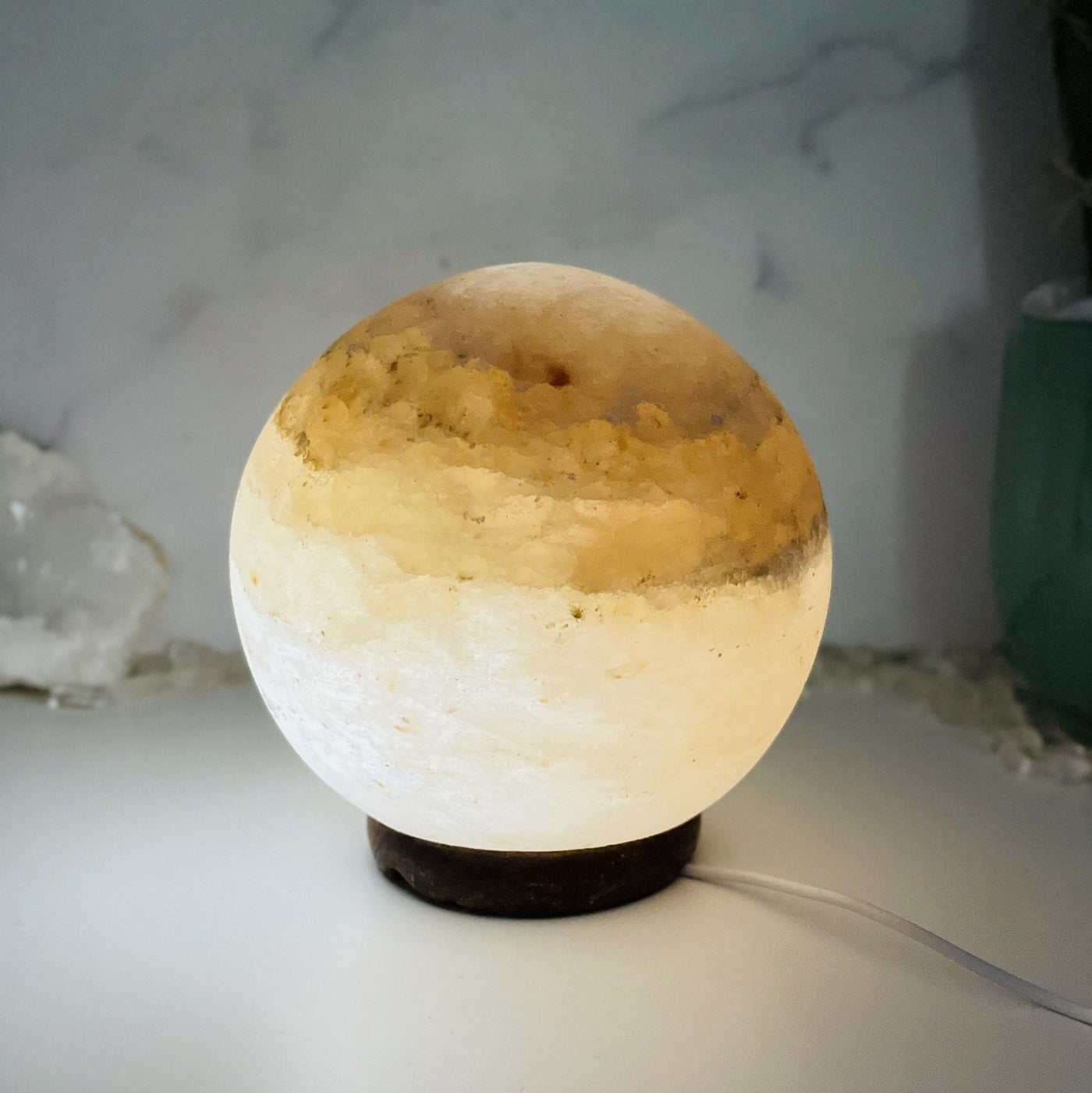 Himalayan Salt Lamp sphere lit up and close up