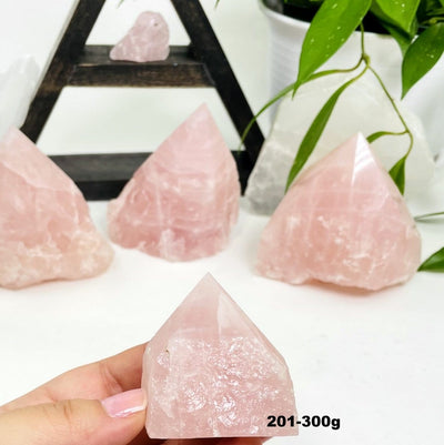 rose quartz semi-polished point showing size in grams