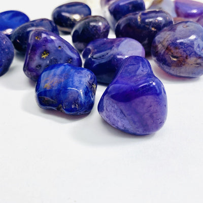 Close uo view of Purple Dyed Agate Tumbled Gemstones 
