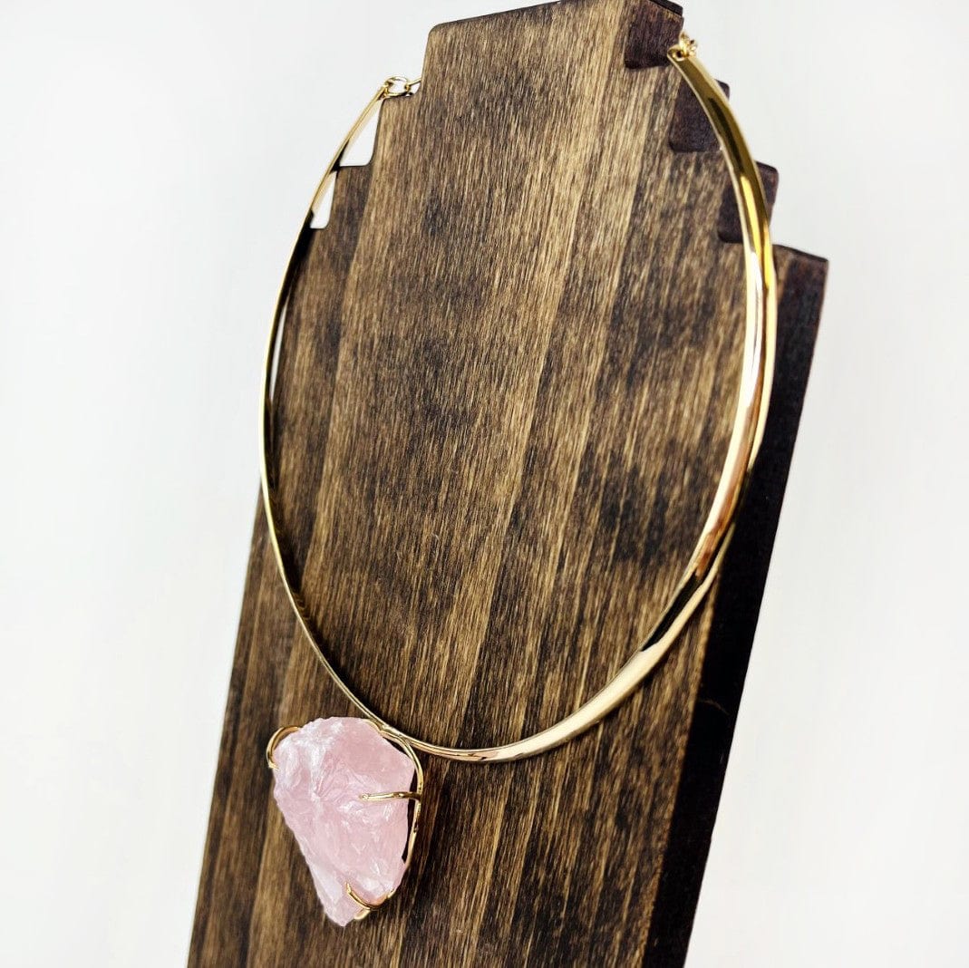 Rose Quartz Choker on a wood stand side view